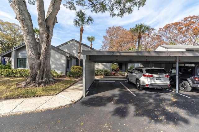 view of car parking with a carport