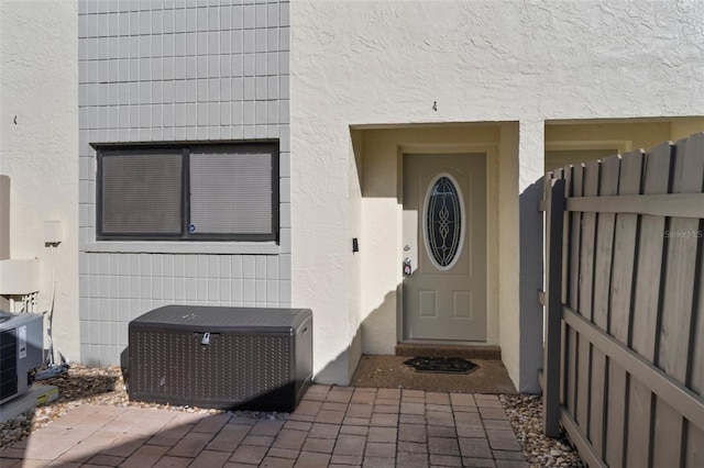 property entrance featuring cooling unit