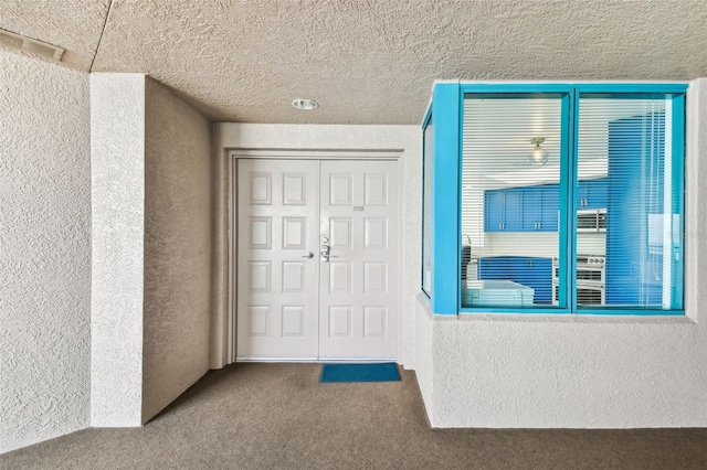 property entrance with a balcony