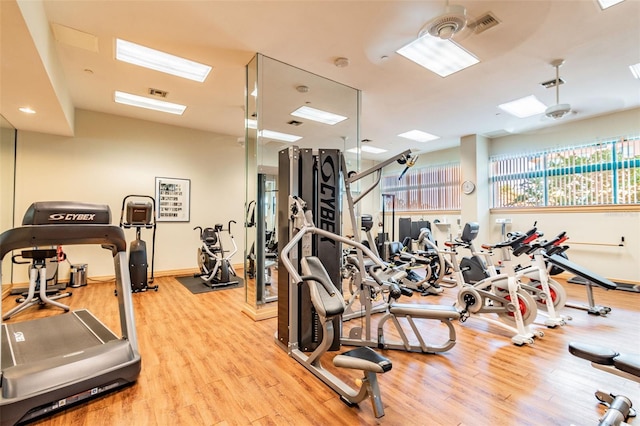 workout area featuring light hardwood / wood-style flooring