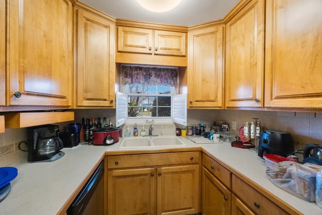 kitchen with sink, decorative backsplash, and dishwasher