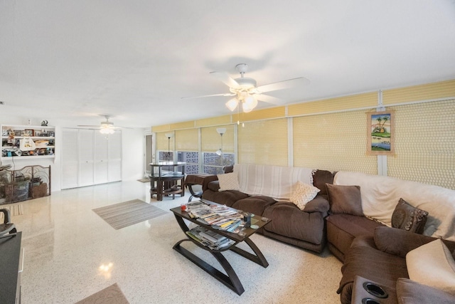 living room featuring ceiling fan