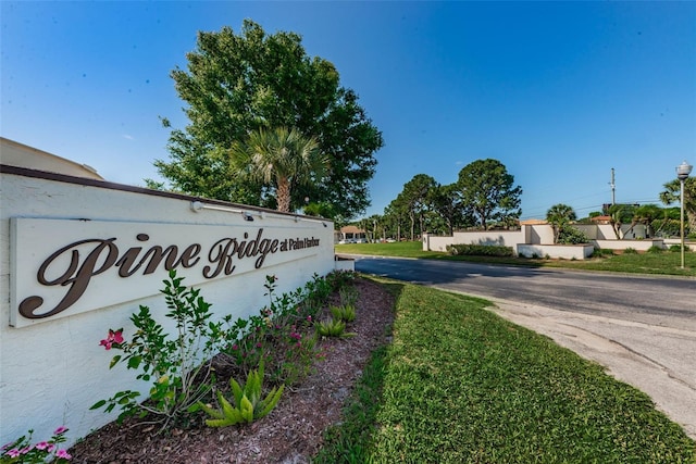 view of community sign