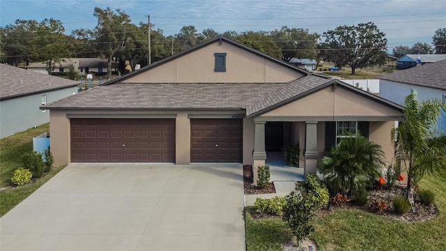 view of front of home with a garage