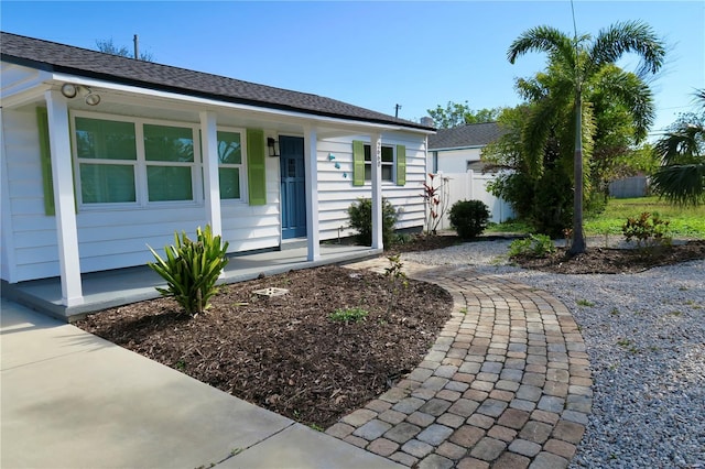 ranch-style house with covered porch