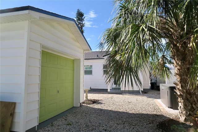 view of yard with an outbuilding and a garage