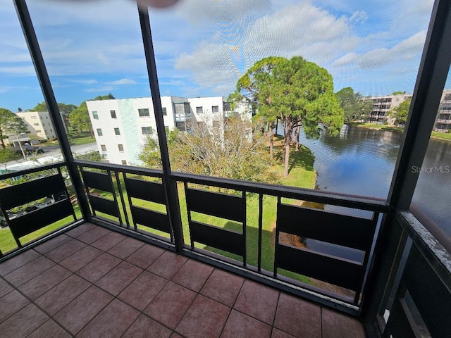 balcony featuring a water view