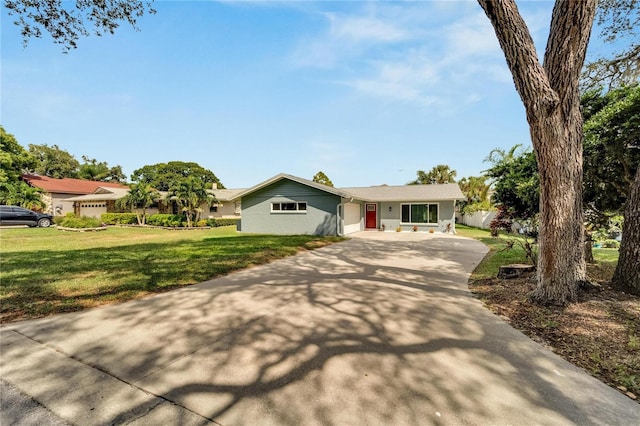 ranch-style house with a front lawn