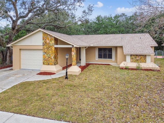 ranch-style home featuring a garage and a front yard