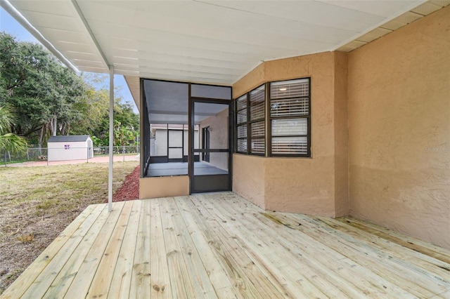 wooden terrace with a storage unit