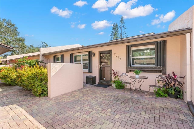 view of front of home with a patio area