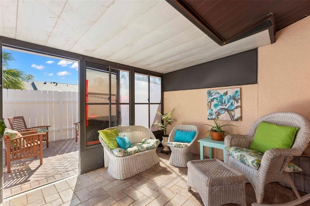 sunroom with wooden ceiling