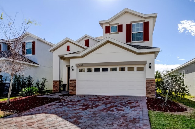 view of front of home with a garage