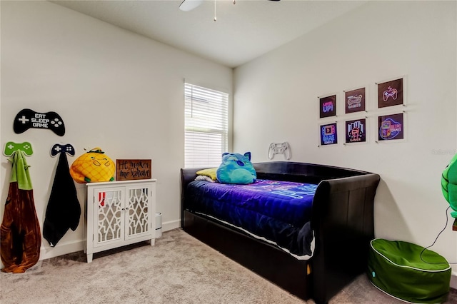 bedroom with ceiling fan and carpet