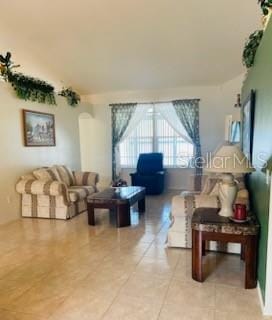 living room featuring tile patterned floors