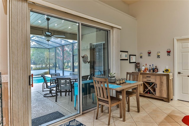 dining room featuring light tile patterned floors and ceiling fan