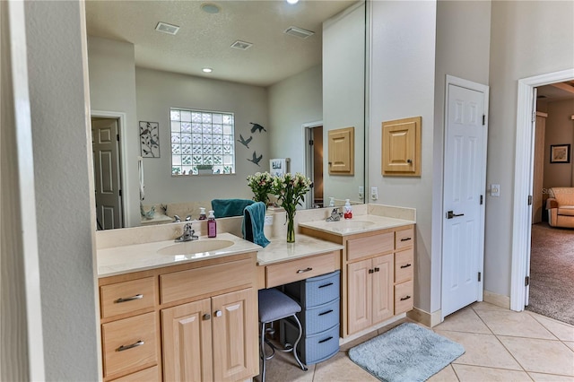 bathroom featuring vanity and tile patterned floors