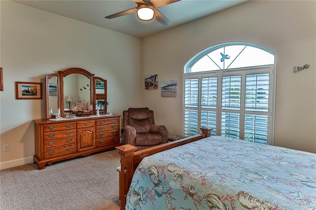 bedroom with light carpet and ceiling fan