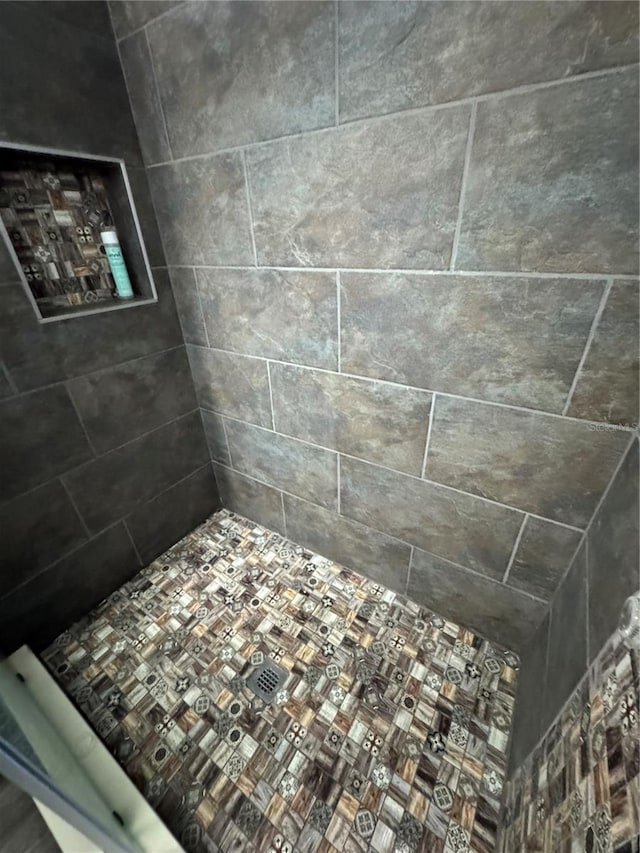 bathroom with a shower