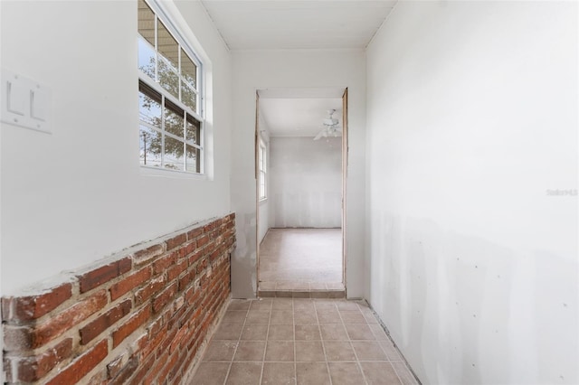 corridor with brick wall