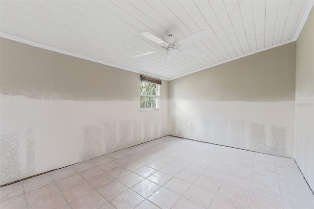 spare room with crown molding, ceiling fan, and wood ceiling