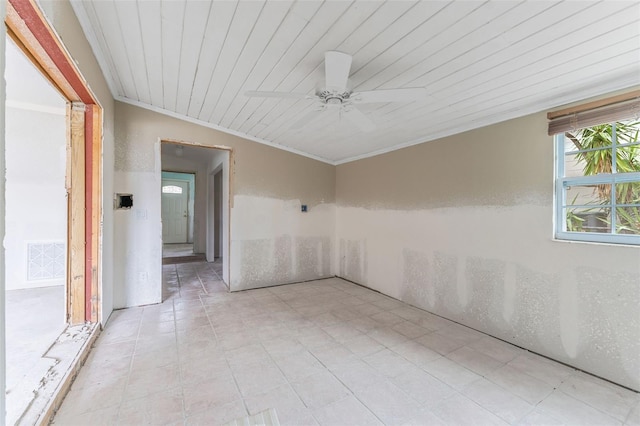 empty room with crown molding, wooden ceiling, and ceiling fan