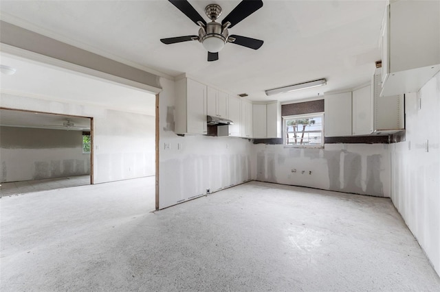 kitchen with white cabinetry and ceiling fan