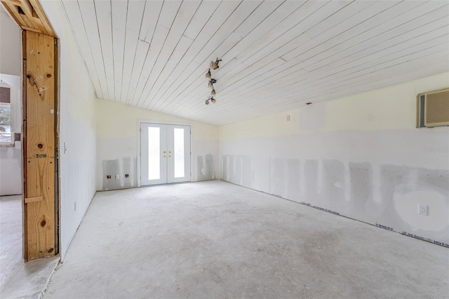 unfurnished room with french doors, lofted ceiling, and wooden ceiling