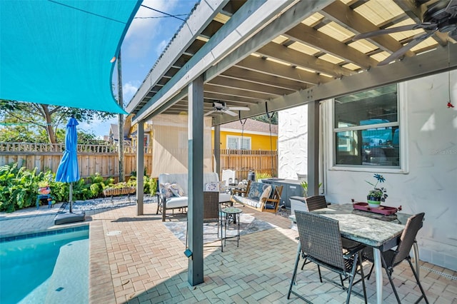 view of patio / terrace with a fenced in pool, outdoor dining space, ceiling fan, a pergola, and a fenced backyard