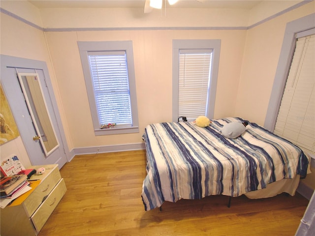 bedroom with light hardwood / wood-style flooring