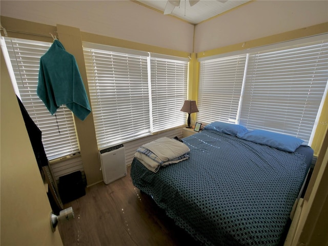 bedroom featuring hardwood / wood-style flooring and ceiling fan