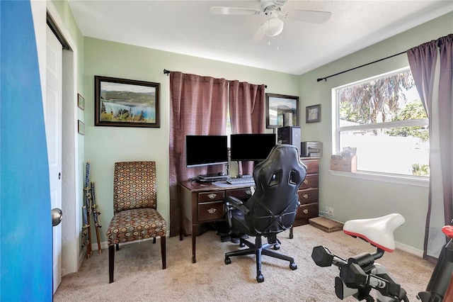 office featuring light colored carpet and ceiling fan