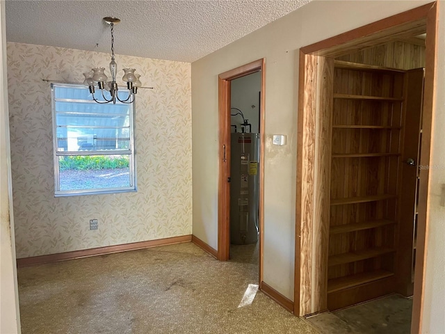 unfurnished dining area with a textured ceiling, water heater, and a chandelier