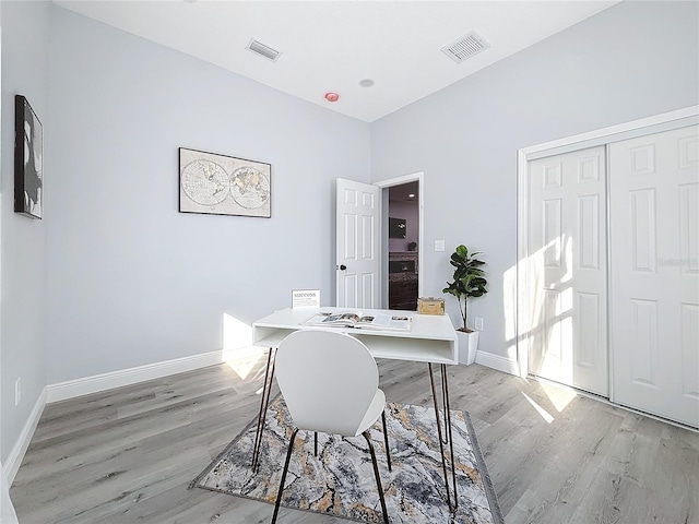 office space featuring light hardwood / wood-style floors