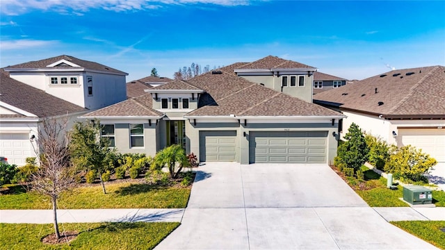 view of front of property with a garage