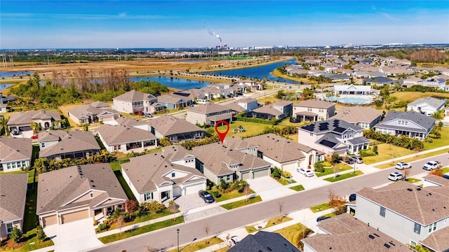 drone / aerial view featuring a water view