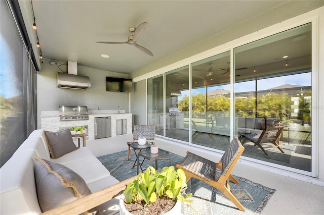 view of patio featuring area for grilling, grilling area, and a mountain view