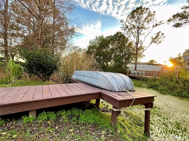 view of property's community featuring a wooden deck