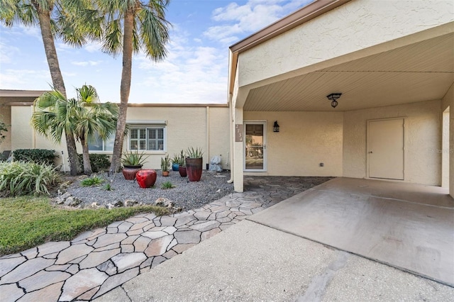 view of patio / terrace with a carport