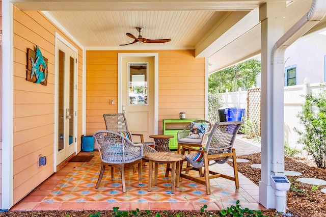 view of patio / terrace featuring ceiling fan