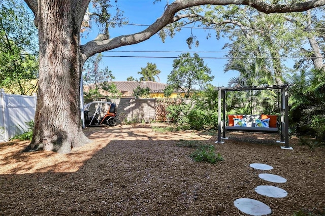 view of yard with fence