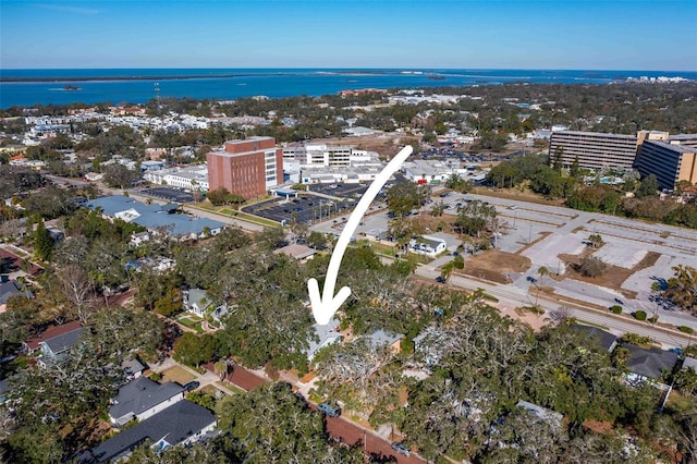 birds eye view of property featuring a water view