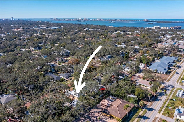 birds eye view of property featuring a water view