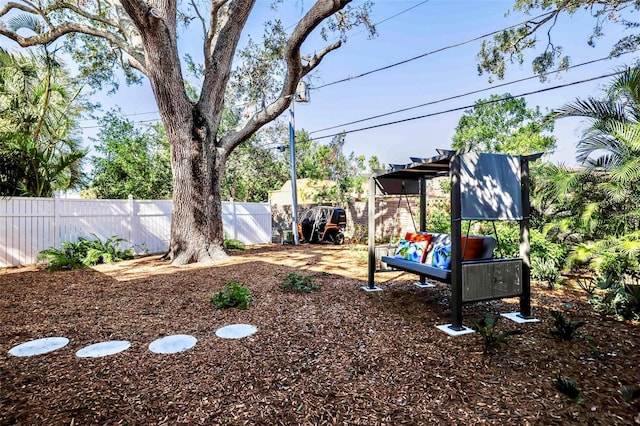 view of yard featuring fence