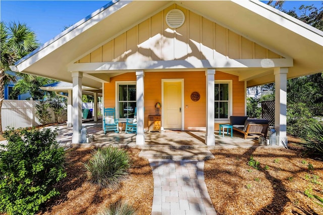 doorway to property featuring covered porch