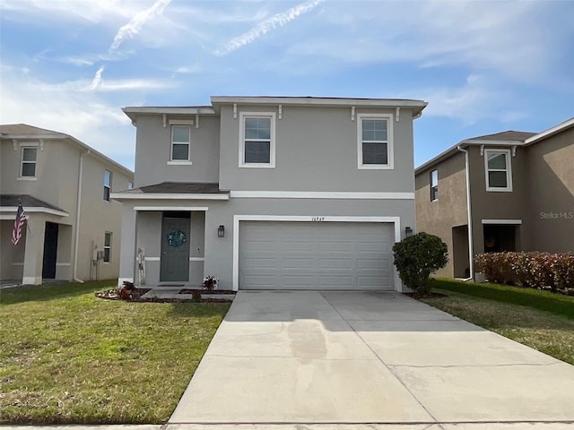traditional home with an attached garage, stucco siding, a front yard, and concrete driveway