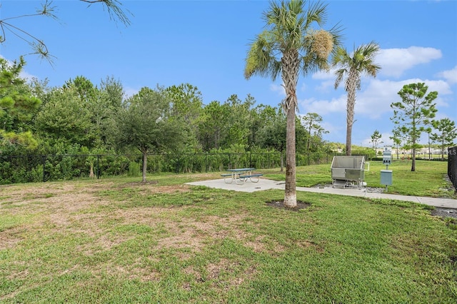 view of yard featuring a patio and fence