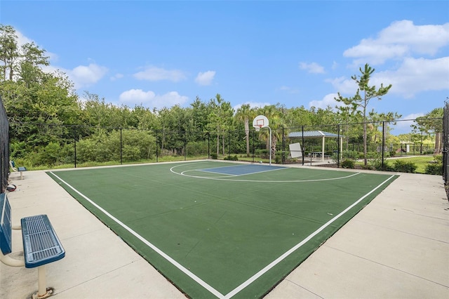 view of sport court with community basketball court and fence