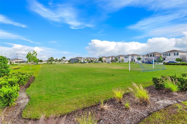 view of yard featuring a residential view