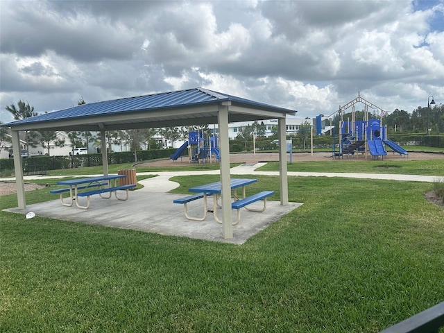 view of property's community featuring a gazebo, a yard, and playground community